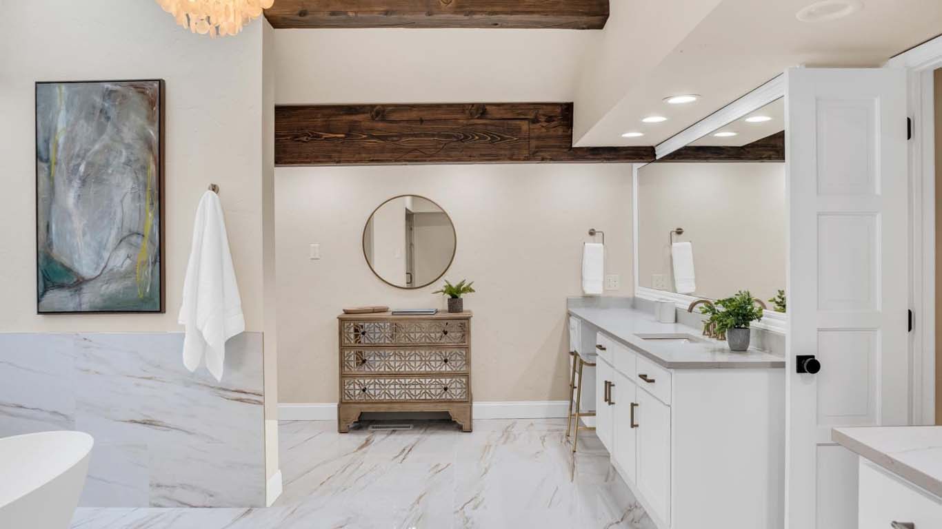 bathroom Luxury master bathroom renovation featuring walk-in tile shower and double vanity in Broken Arrow by Story Remodeling